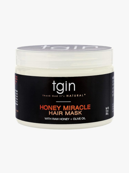 TGIN Honey Miracle Hair Mask off white jar with black label on light gray background
